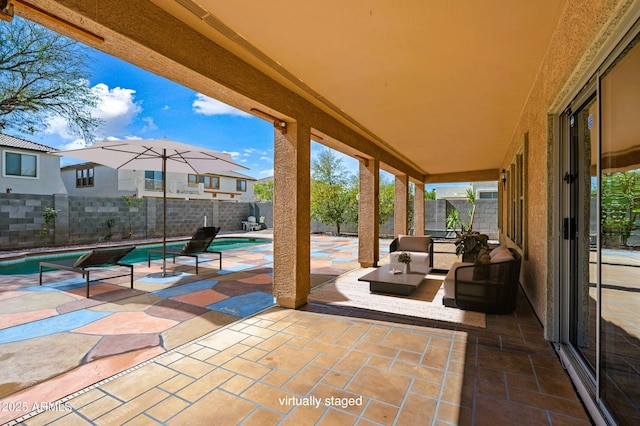 view of patio featuring a fenced in pool and a fenced backyard