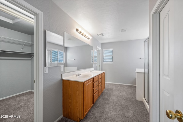 full bath featuring carpet floors, a stall shower, and visible vents