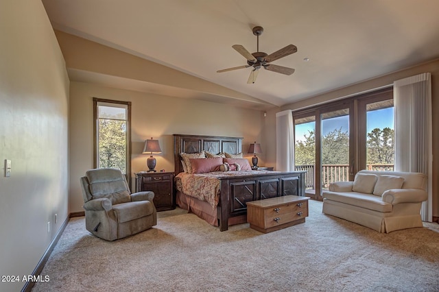 carpeted bedroom featuring ceiling fan, access to outside, and vaulted ceiling