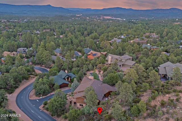 aerial view at dusk with a mountain view