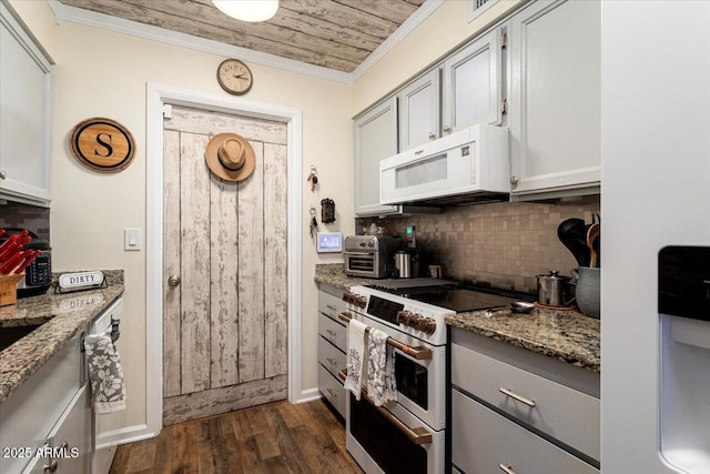 kitchen featuring tasteful backsplash, white appliances, dark hardwood / wood-style flooring, crown molding, and light stone counters