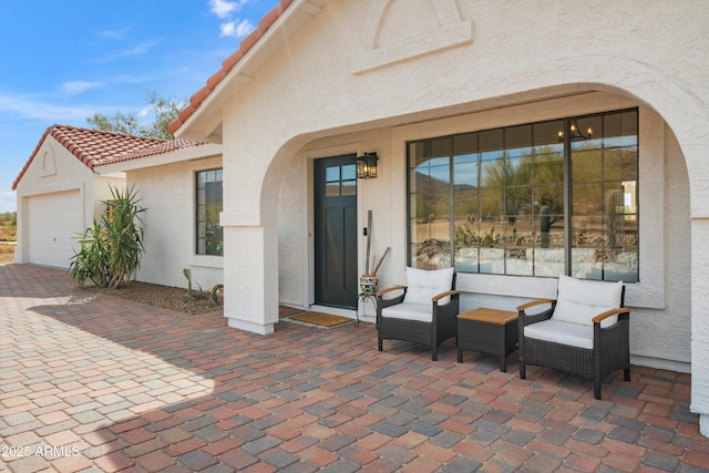 view of patio with a garage