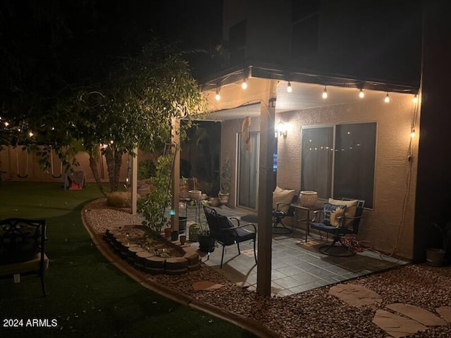 view of patio at night