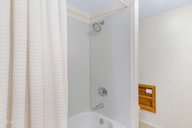 full bath with tile patterned flooring and shower / bath combo with shower curtain