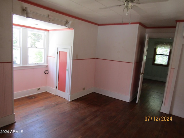60 Wood Cyn, Bisbee, AZ 85603 - unfurnished room with baseboards, dark wood-style floors, ceiling fan, and crown molding