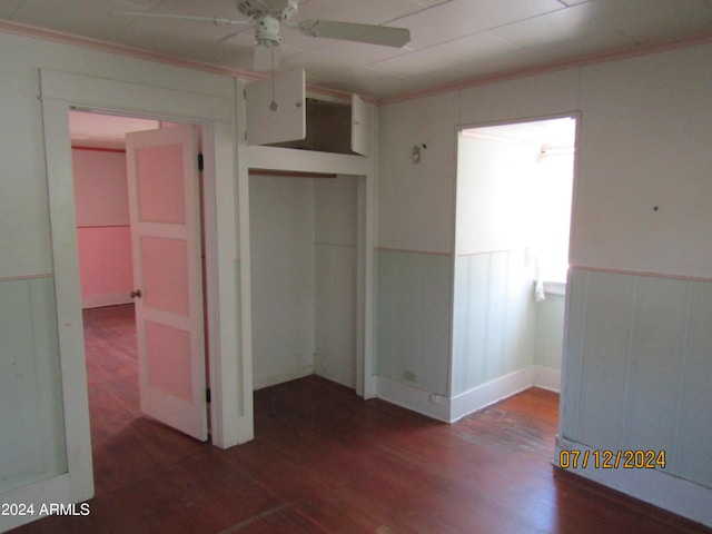 60 Wood Cyn, Bisbee, AZ 85603 - unfurnished bedroom featuring ornamental molding, wood finished floors, and wainscoting