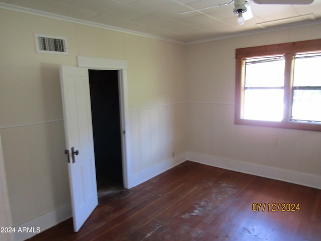 60 Wood Cyn, Bisbee, AZ 85603 - unfurnished room featuring dark wood-type flooring, ceiling fan, visible vents, and crown molding