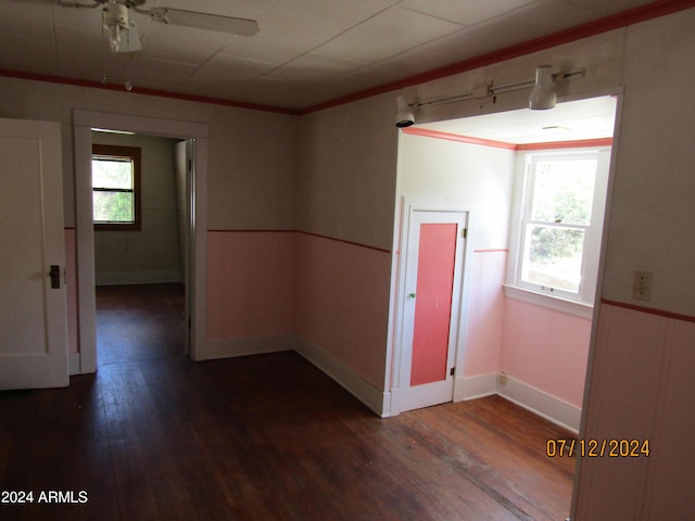 60 Wood Cyn, Bisbee, AZ 85603 - spare room featuring dark wood-style flooring, ceiling fan, a healthy amount of sunlight, and crown molding