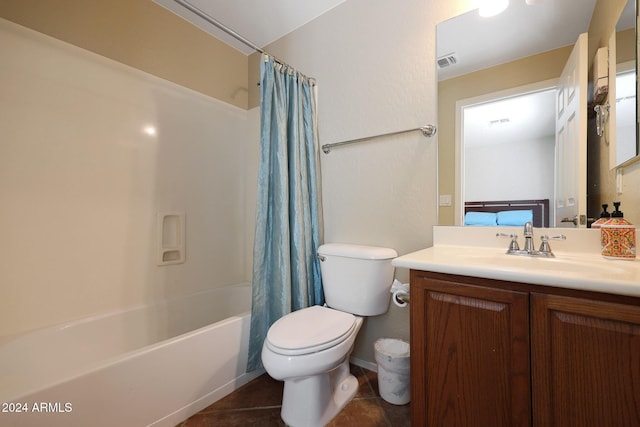 full bathroom featuring visible vents, shower / tub combo with curtain, vanity, toilet, and tile patterned floors
