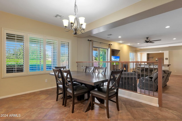 dining room with visible vents, tile patterned flooring, baseboards, recessed lighting, and ceiling fan with notable chandelier