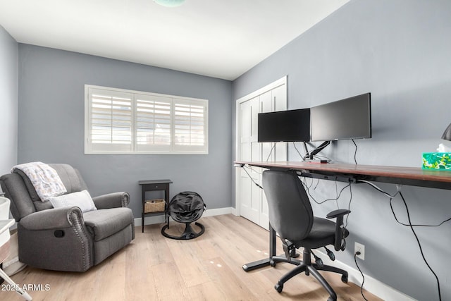 office space featuring light hardwood / wood-style floors