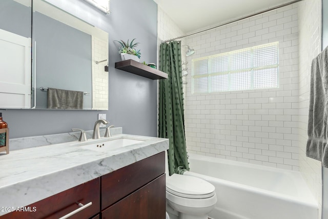 full bathroom featuring vanity, shower / bathtub combination with curtain, and toilet