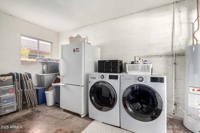 laundry room with separate washer and dryer and gas water heater