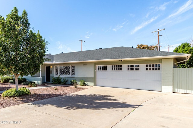 ranch-style home featuring a garage