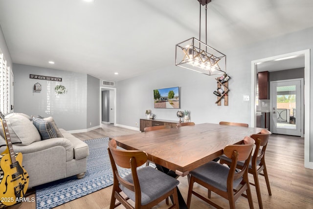 dining room with hardwood / wood-style floors