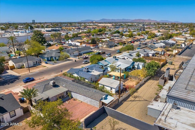 bird's eye view featuring a mountain view and a residential view