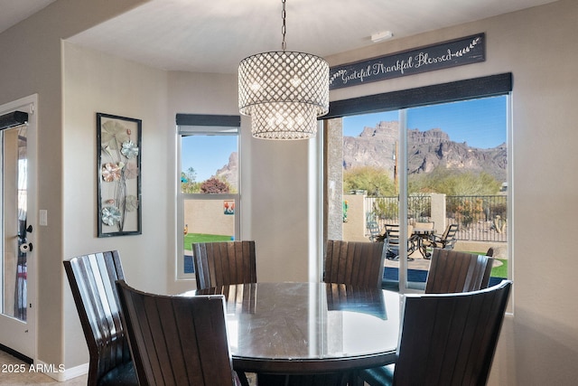 dining area featuring a chandelier