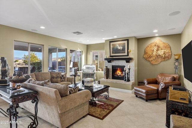 tiled living room with a fireplace