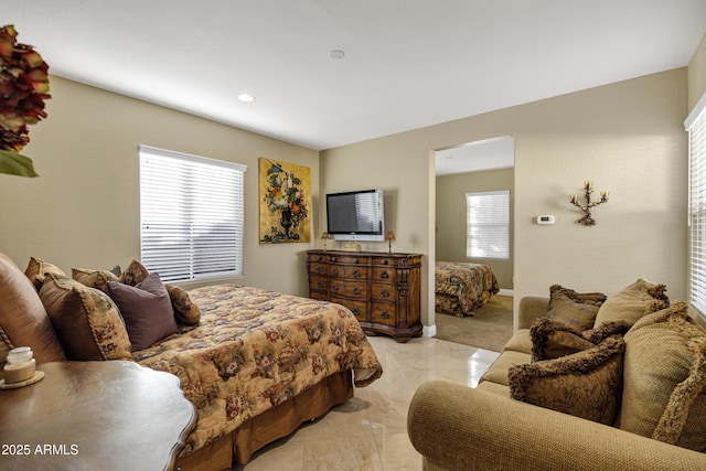 bedroom with multiple windows