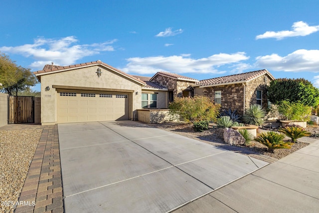 ranch-style home featuring a garage