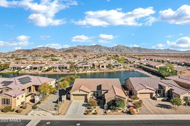 aerial view with a water and mountain view