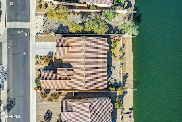 drone / aerial view featuring a water view