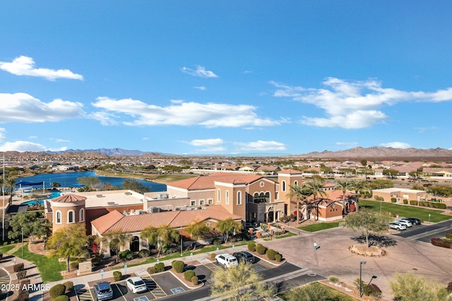 aerial view with a water and mountain view