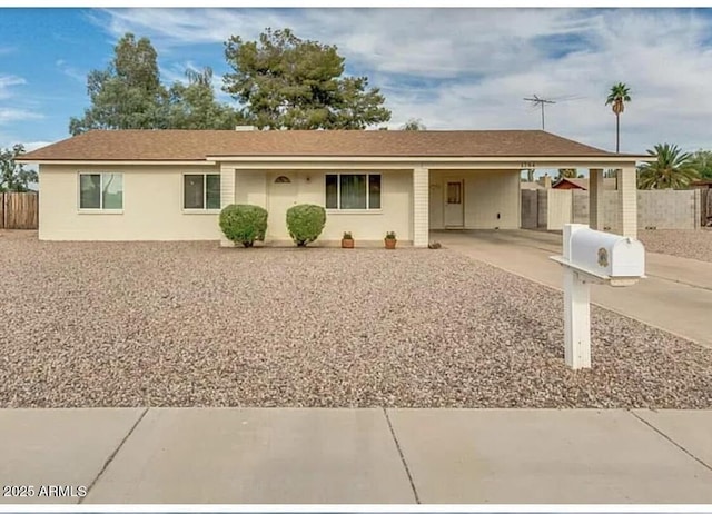 1784 N Kadota Ave, Casa Grande, AZ 85122 - single story home with a carport and driveway