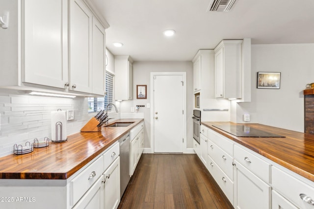 1649 W Royal Palm Rd, Phoenix, AZ 85021 - kitchen featuring butcher block countertops, a sink, appliances with stainless steel finishes, dark wood-type flooring, and backsplash