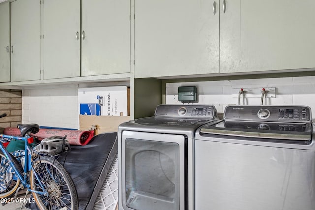 1649 W Royal Palm Rd, Phoenix, AZ 85021 - laundry room featuring washing machine and clothes dryer and cabinet space