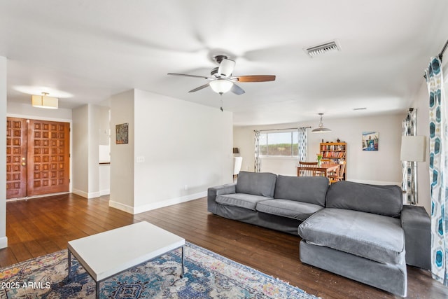 1649 W Royal Palm Rd, Phoenix, AZ 85021 - living room with ceiling fan, wood-type flooring, and baseboards