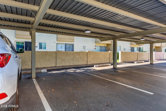 view of car parking featuring a carport