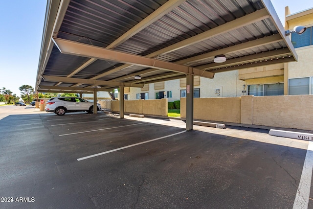 view of parking with a carport