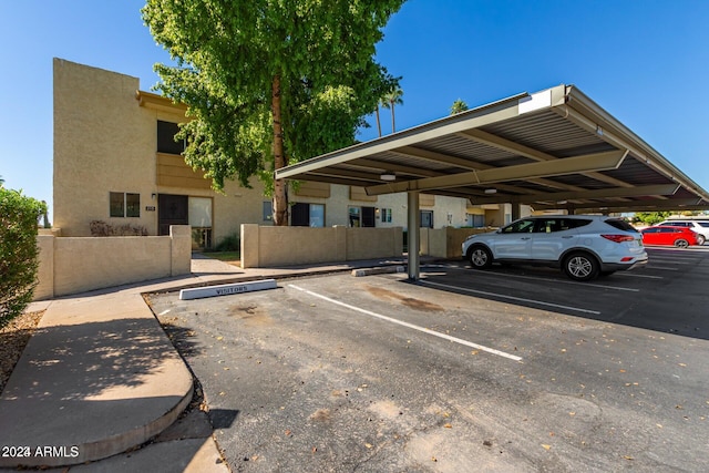 view of car parking featuring a carport