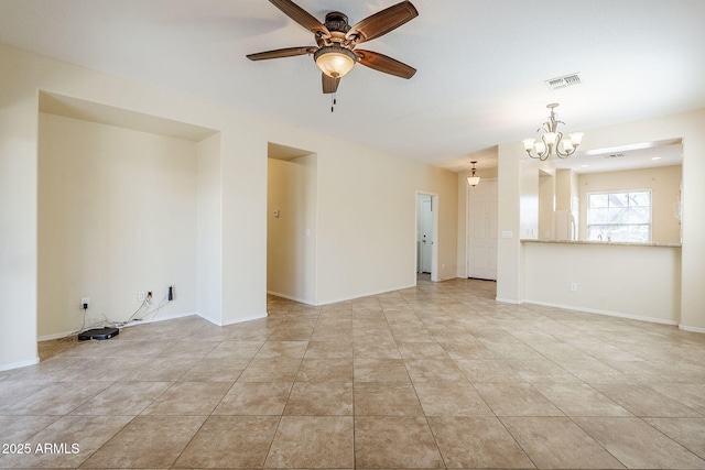 spare room featuring visible vents, baseboards, light tile patterned flooring, and ceiling fan with notable chandelier