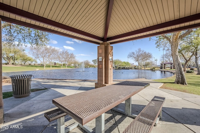 view of patio / terrace featuring a water view