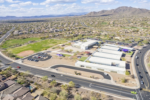 drone / aerial view featuring a mountain view and a residential view