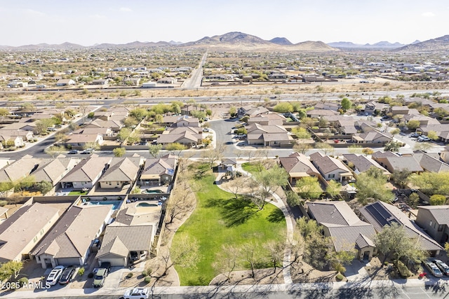 bird's eye view featuring a mountain view and a residential view