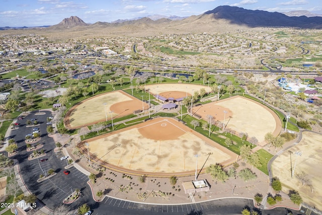 birds eye view of property featuring a mountain view