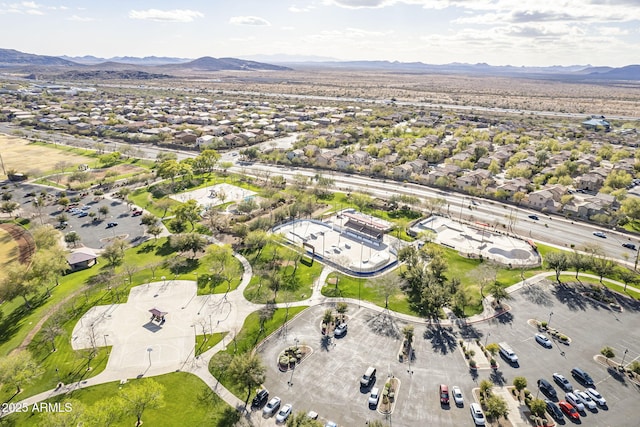 drone / aerial view with a residential view and a mountain view