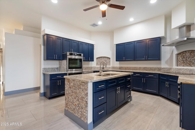 28301 N 154th St, Scottsdale, AZ 85262 - kitchen featuring stainless steel double oven, a sink, blue cabinetry, ceiling fan, and black electric cooktop