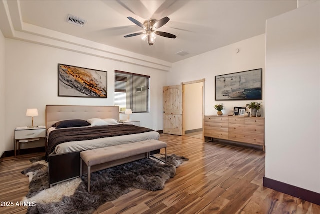 28301 N 154th St, Scottsdale, AZ 85262 - bedroom with wood finished floors, baseboards, and ceiling fan