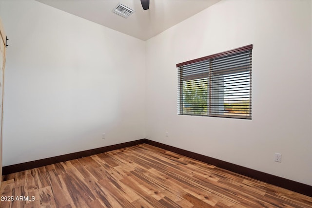 28301 N 154th St, Scottsdale, AZ 85262 - spare room featuring a ceiling fan, wood finished floors, and baseboards