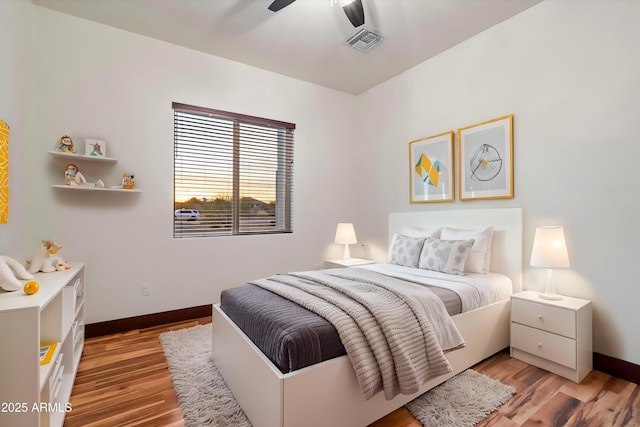 28301 N 154th St, Scottsdale, AZ 85262 - bedroom featuring light wood-style flooring, baseboards, and a ceiling fan