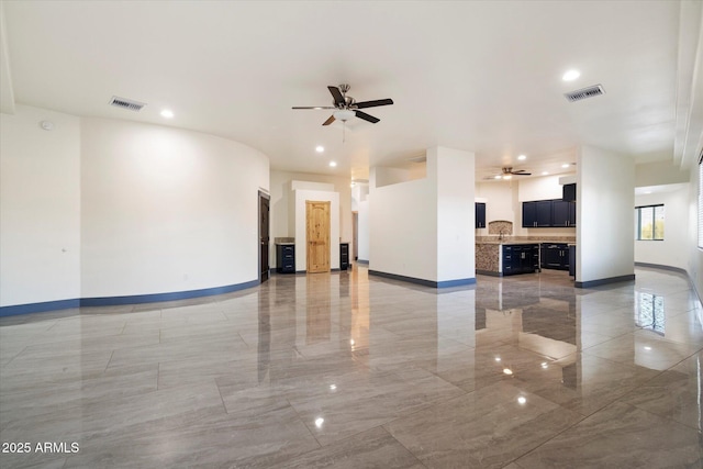 28301 N 154th St, Scottsdale, AZ 85262 - unfurnished living room with a ceiling fan, light marble finish flooring, baseboards, and recessed lighting