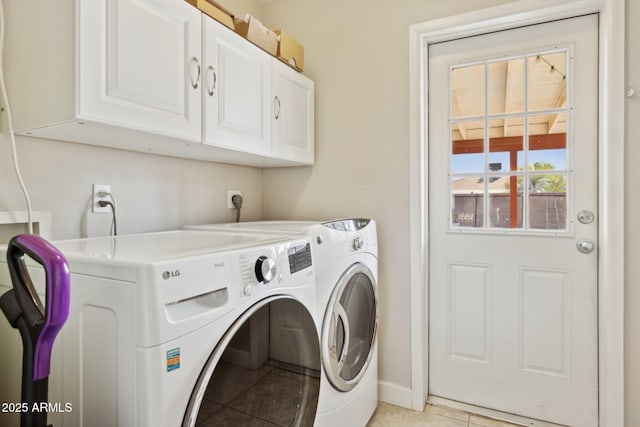 8107 E Mitchell Dr, Scottsdale, AZ 85251 - clothes washing area with light tile patterned floors, baseboards, cabinet space, and washing machine and clothes dryer