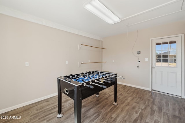 8107 E Mitchell Dr, Scottsdale, AZ 85251 - rec room featuring attic access, baseboards, and wood finished floors