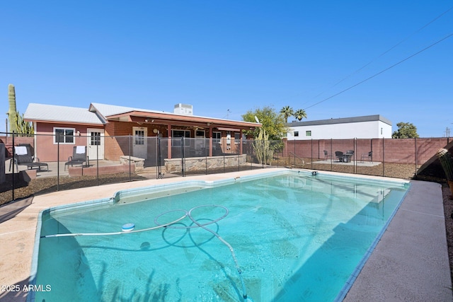8107 E Mitchell Dr, Scottsdale, AZ 85251 - view of pool featuring a fenced in pool, a patio, and fence