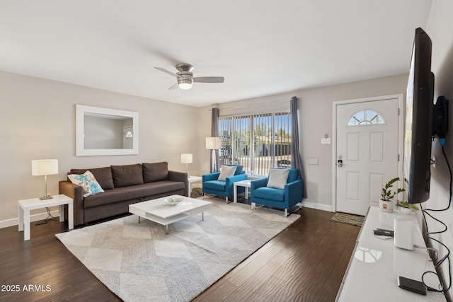 8107 E Mitchell Dr, Scottsdale, AZ 85251 - living area with dark wood-type flooring, baseboards, and ceiling fan