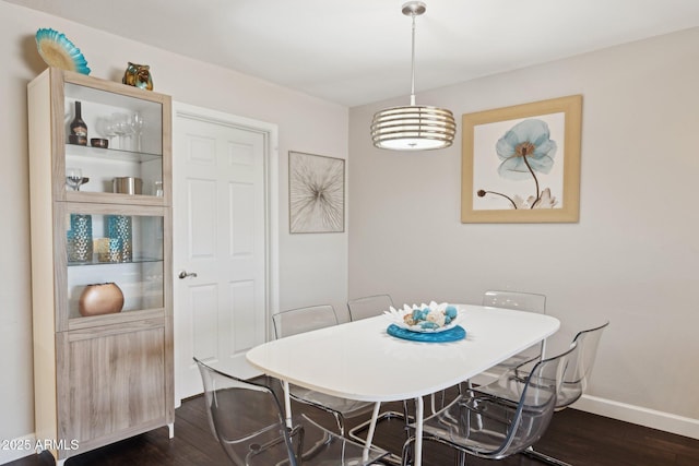 8107 E Mitchell Dr, Scottsdale, AZ 85251 - dining room featuring dark wood-style floors and baseboards